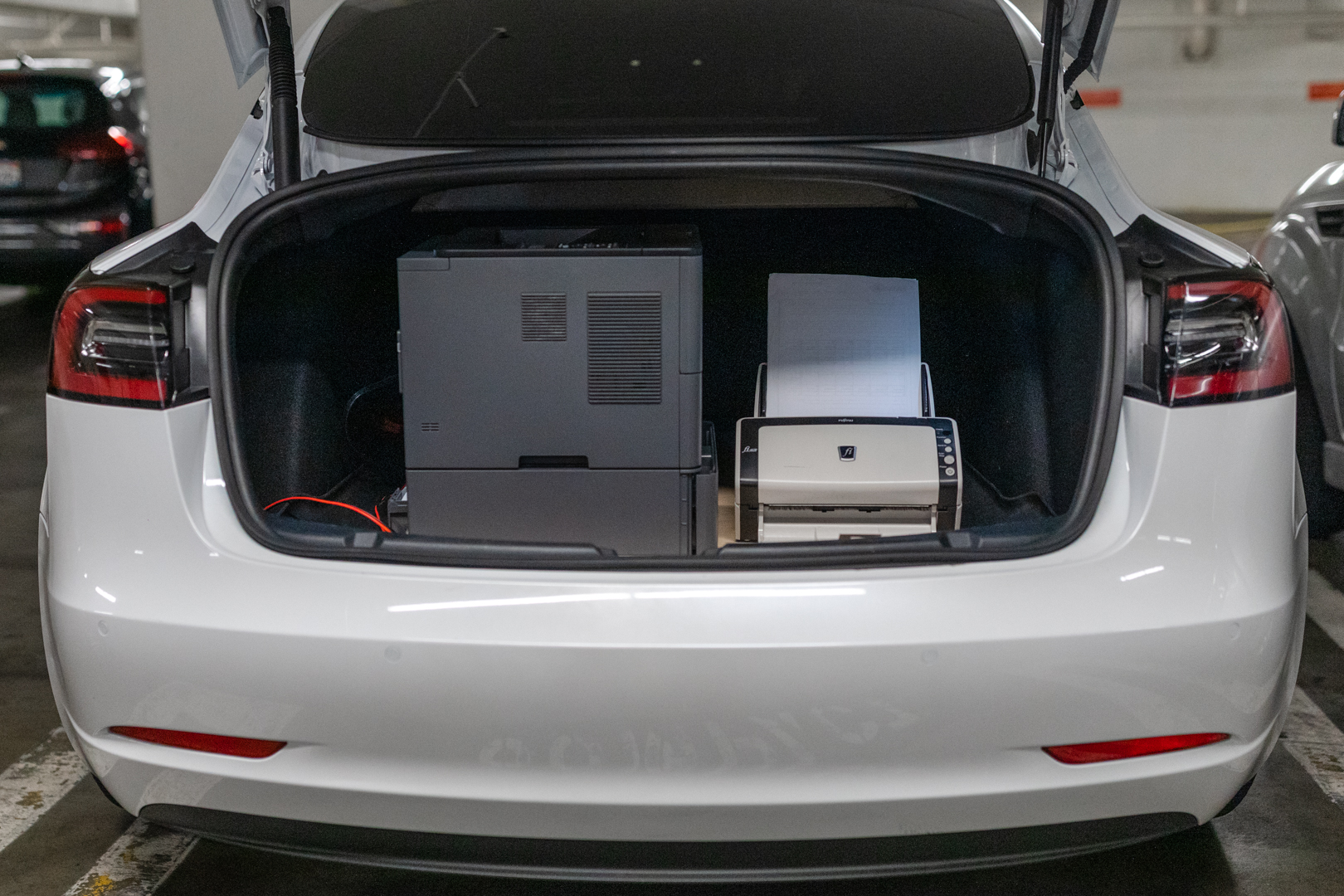 Deanna's mobile office: printer and scanner in the trunk of her car